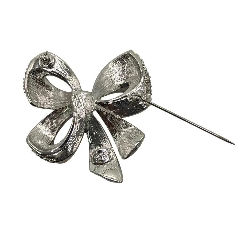 Nolan‎ Miller Bow Pin Brooch Rhinestone Enamel Silver Tone
